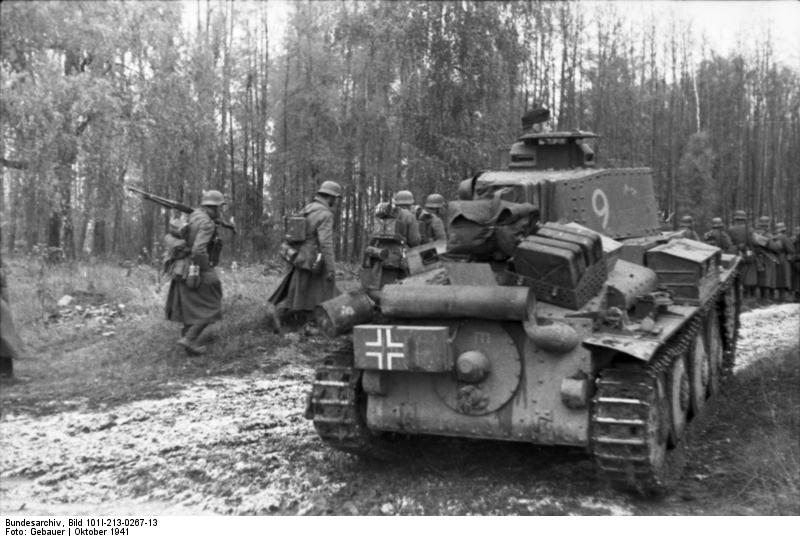 German tank and infantry advancing